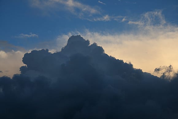Blue Sky breaking through the Clouds